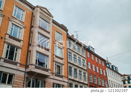 Architectural colorful facade of classic style urban building in Copenhagen, Denmark Architectural colorful facade of classic style urban building in Copenhagen, Denmark 121302197