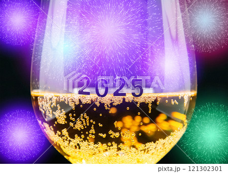 A glass of champagne elegantly displayed with 2025 written on it 121302301