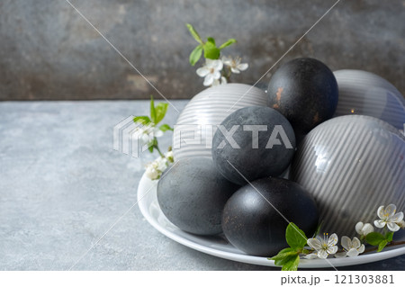 Elegant Black and gray Decorative Eggs with cherry blossom branch Elegant Black and gray Decorative Eggs with cherry blossom branch 121303881