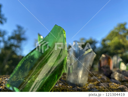 broken glass bottles on the fence to protect private territory from trespassing broken glass bottles on the fence to protect private territory from trespassing 121304419