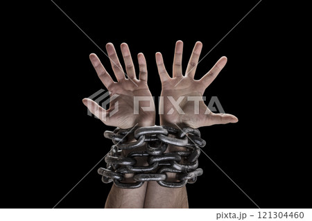 Two hands in chains isolated on black background with clipping path 121304460
