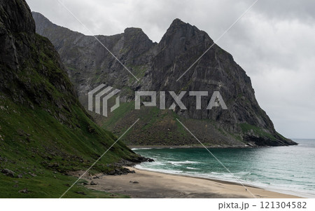 Cloudy skies above Kvalvika beach in Lofoten, Norway 121304582