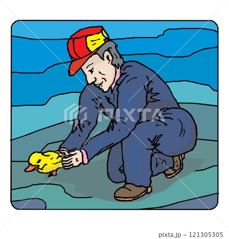 Farmer holding a little duck on the farm 121305305