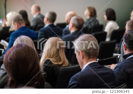 Audience attentively listening to speaker in business seminar 121306345