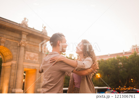 Couple dancing swing in front of puerta de alcala in madrid 121306761
