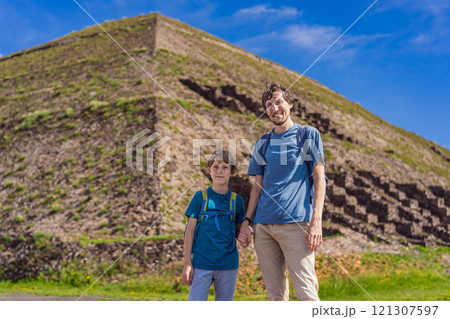 Father and son tourists exploring Teotihuacan, Mexico. Cultural heritage, ancient ruins, and archaeological adventure concept Father and son tourists exploring Teotihuacan, Mexico. Cultural heritage, ancient ruins, and archaeological adventure concept 121307597