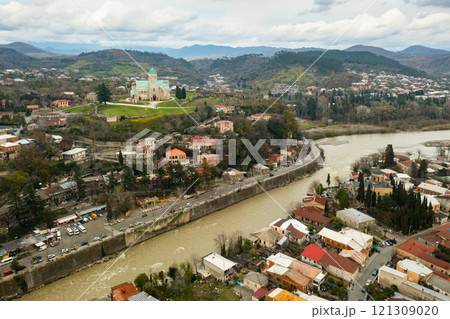 Aerial view of Kutaisi cityscape with Bagrati Cathedral in spring, Georgia Aerial view of Kutaisi cityscape with Bagrati Cathedral in spring, Georgia 121309020