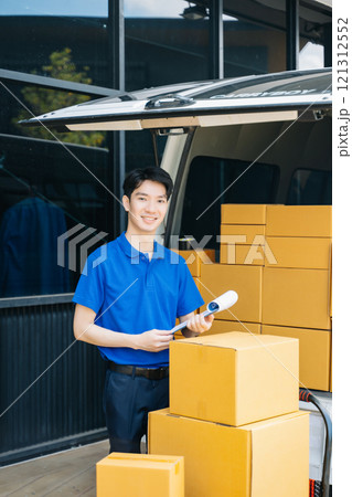 Portrait of courier delivery man searching the address on digital tablet. Delivery service, 121312552