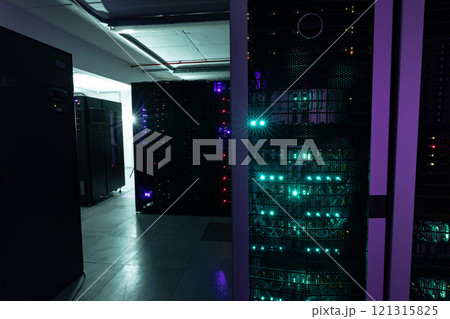 Data center with multiple rows of fully operational server racks 121315825