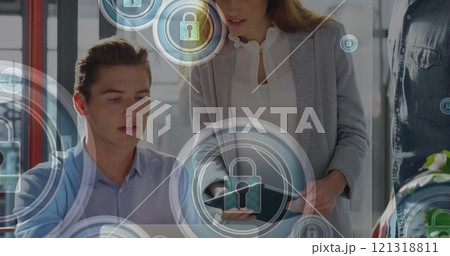 Image of icons and data processing over diverse business people in office 121318811