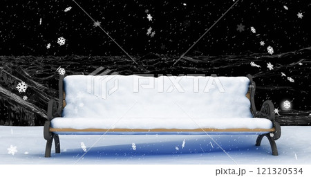 Image of snow falling over christmas bench in snow in winter scenery 121320534
