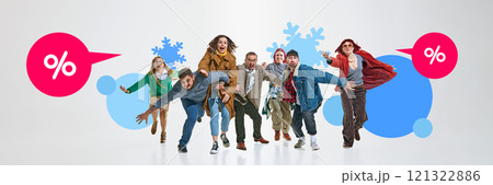 Group of people moving forward energetically, chasing after pink discount speech bubbles, surrounded by blue snowflakes and circles. Group of people moving forward energetically, chasing after pink discount speech bubbles, surrounded by blue snowflakes and circles. 121322886