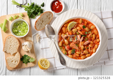 Pasulj, white bean soup with chicken in bowl 121325328