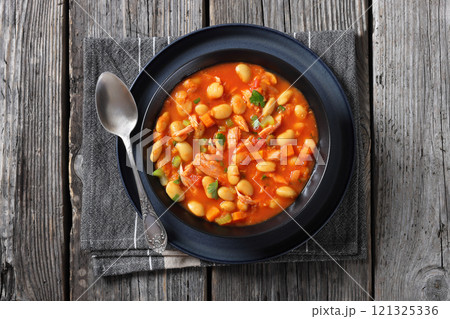 Pasulj, white bean soup with chicken in bowl Pasulj, white bean soup with chicken in bowl 121325336