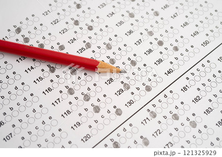 Answer sheets with pencil drawing fill to select choice, education. 121325929