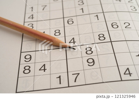 Sudoku puzzle, game to play for keep you brain younger for developing Alzheimer disease in senior patient. 121325946