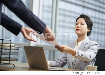young asian business woman working in modern office young asian business woman working in modern office 121326559