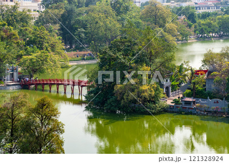 View of red bridge or The Huc Bridge in Hoan Kiem Lake, Hanoi City, Vietnam 121328924