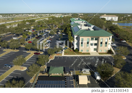 Fenced backyard facility with solar photovoltaic panels for producing of clean ecological electrical energy. Concept of autonomous housing Fenced backyard facility with solar photovoltaic panels for producing of clean ecological electrical energy. Concept of autonomous housing 121330343