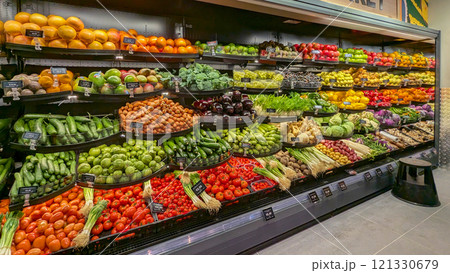 Assortment of vibrant fresh fruits and vegetables in grocery store fresh Fruits and Vegetables section Assortment of vibrant fresh fruits and vegetables in grocery store fresh Fruits and Vegetables section 121330679