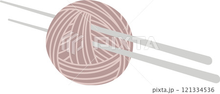 Knitting needles are skillfully maneuvering through a ball of yarn, creating a cozy and handmade craft, perfect for winter warmth and hobbies 121334536