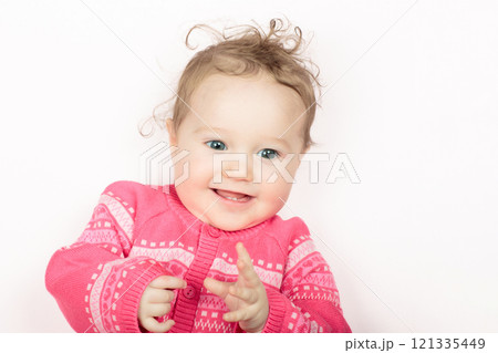 Little baby girl on white bed Little baby girl on white bed 121335449