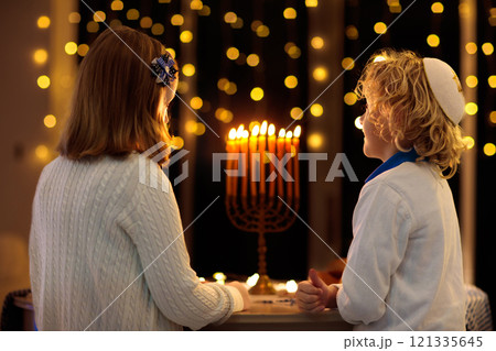 Kids celebrating Hanukkah. Festival of lights. 121335645