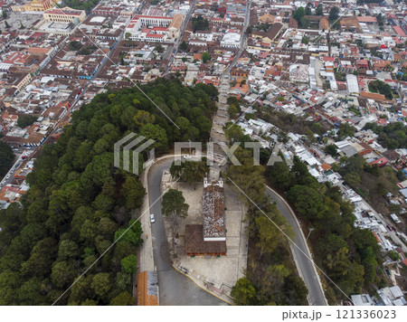 Aerial Drone shot of Church Iglesia de San Cristobalito on the mountain in San Cristobal de Las Casas, Chiapas, Mexico Aerial Drone shot of Church Iglesia de San Cristobalito on the mountain in San Cristobal de Las Casas, Chiapas, Mexico 121336023