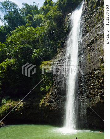 Alalum Falls with green plunge basin. Bukidnon, Philippines. Alalum Falls with green plunge basin. Bukidnon, Philippines. 121337563