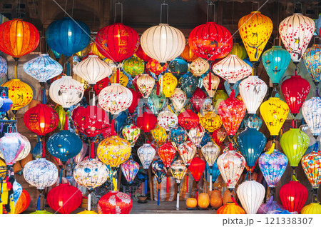 background with colorful Vietnamese silk lanterns in Vietnam in Asia in the old town on streets of Hoi An city 121338307
