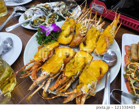 Lobster Prawn with Cheese melted cheese on top Lobster Prawn with Cheese melted cheese on top 121338485