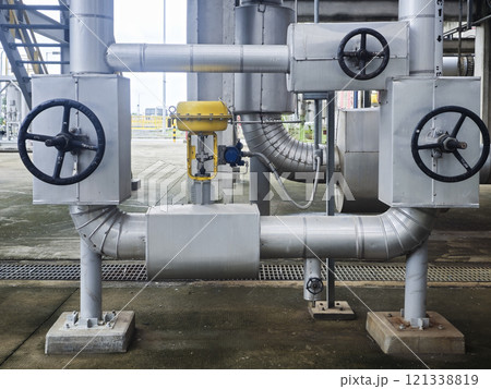 A pipe with two valves on it A pipe with two valves on it 121338819
