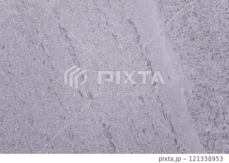 A grey stone wall with a white stripe A grey stone wall with a white stripe 121338953