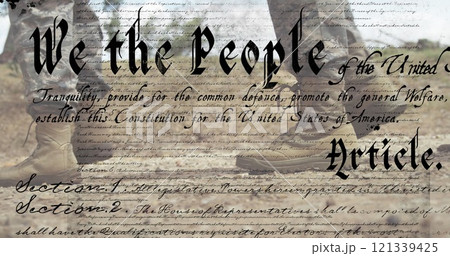 Walking in military boots, soldier over Constitution text image Walking in military boots, soldier over Constitution text image 121339425