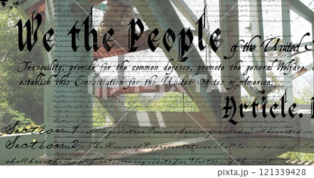 Constitution text image over soldier walking on metal structure 121339428