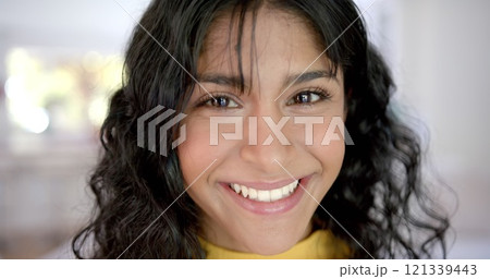 Portrait of happy biracial female teenager with long hair at home 121339443