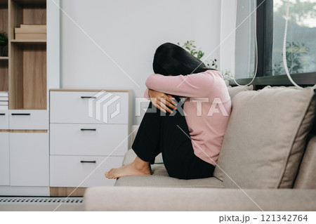 woman sit Depression Standing by window and anxiety Copy space. woman sit Depression Standing by window and anxiety Copy space. 121342764