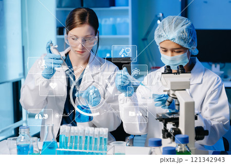 Scientist two woman with tablet and laptop, laboratory and ecofriendly science. Agriculture, research and scientists with online reading, test samples Scientist two woman with tablet and laptop, laboratory and ecofriendly science. Agriculture, research and scientists with online reading, test samples 121342943