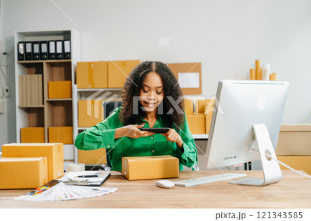 Small business entrepreneur SME freelance woman working at home office, BOX,tablet Small business entrepreneur SME freelance woman working at home office, BOX,tablet 121343585
