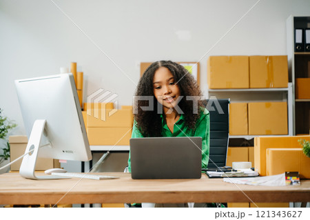 Small business entrepreneur SME freelance woman working at home office, BOX,tablet Small business entrepreneur SME freelance woman working at home office, BOX,tablet 121343627