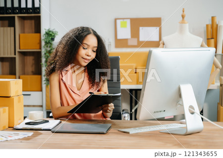 Small business entrepreneur SME freelance woman working at home office, BOX,tablet 121343655