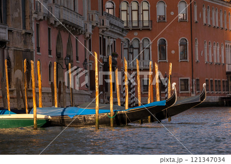 Venice, Italy gondolas parked, Grand canal 121347034