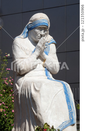Mother Teresa statue in front St Paul's Cathedral in Tirana, Albania 121350966