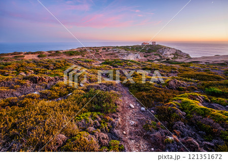 Cabo Espichel cape Espichel on Atlantic ocean at sunset Cabo Espichel cape Espichel on Atlantic ocean at sunset 121351672