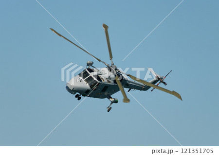 Military helicopter in sky 121351705