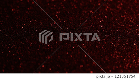 Defocused particles. Red shimmer. Flare precious festive surface with blurred metallic dust. Glamour starry night powder texture effect. 121351754