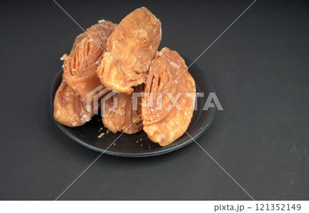 Very delicious dessert khaja in black background Very delicious dessert khaja in black background 121352149