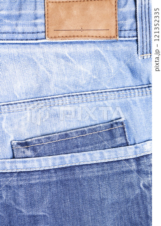Blue jeans pocket with blank label close up 121352335