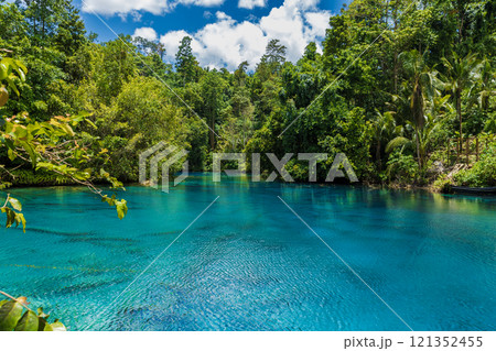 Lake with crystal blue water in tropical rain forest in Indonesia. 121352455