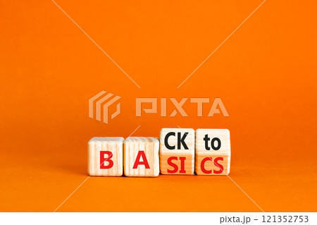 Back to basics symbol. Concept words Back to basics on wooden block. Beautiful orange table orange background. Business back to basics concept. Copy space. Back to basics symbol. Concept words Back to basics on wooden block. Beautiful orange table orange background. Business back to basics concept. Copy space. 121352753